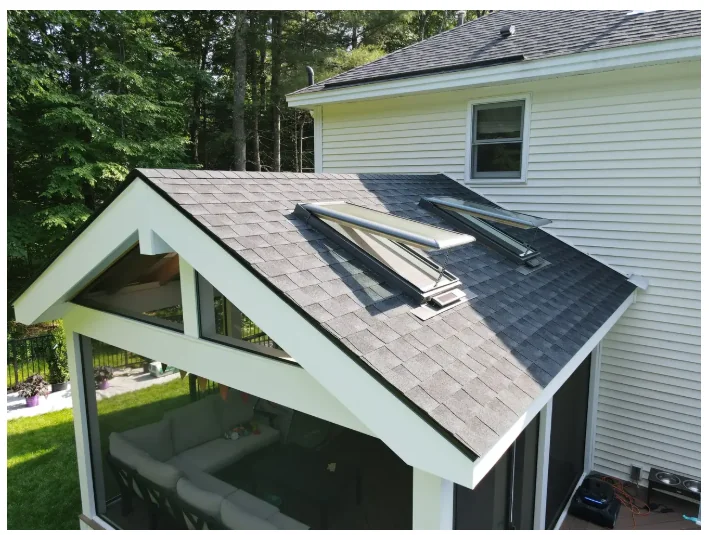 Fixed VELUX skylight installed above a sunroom addition
