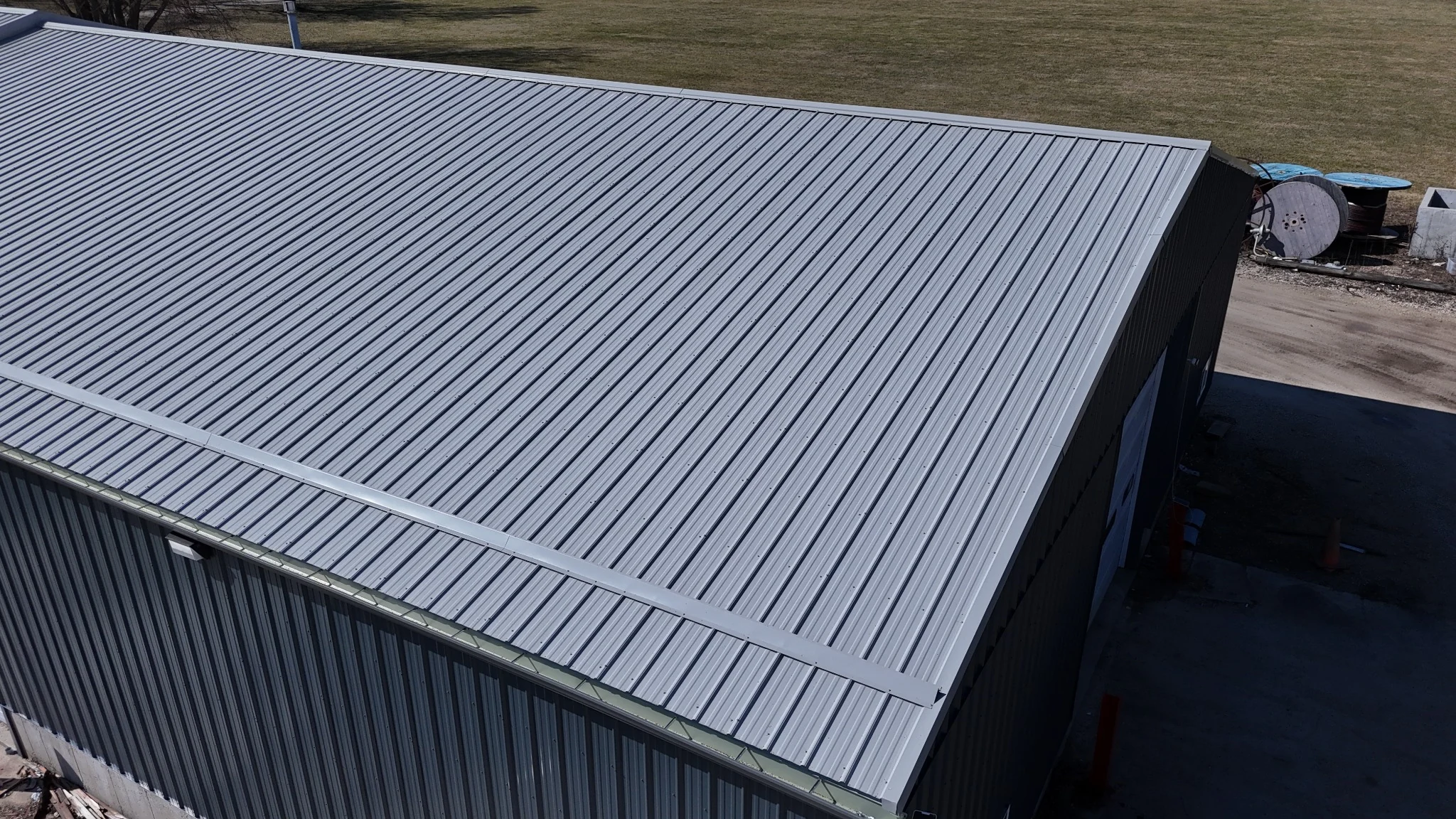 Corrugated metal roofing and matching siding on a building in Pingree Grove, Illinois