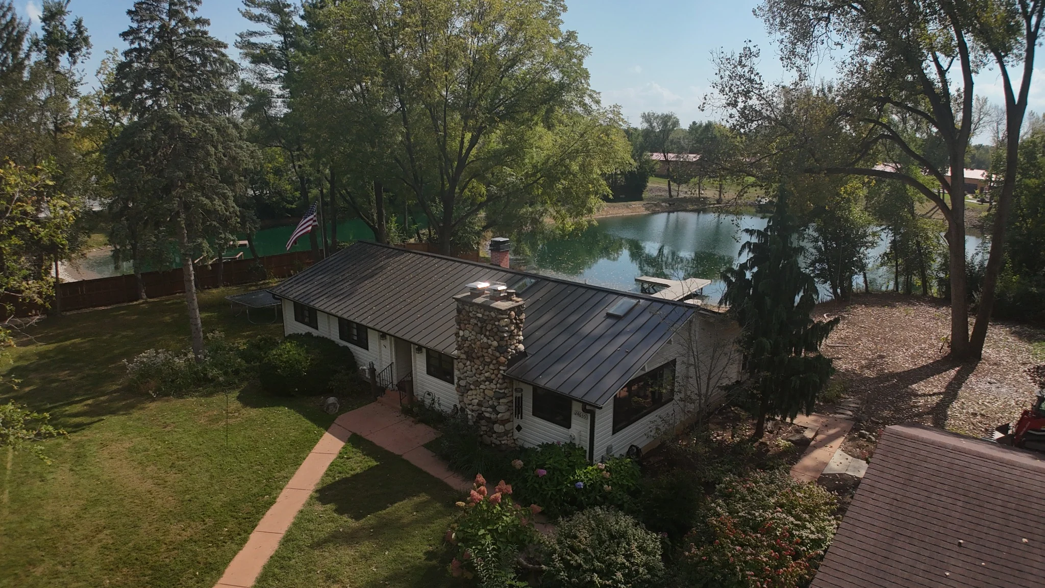 Dark bronze architectural metal roof on a residential property in Plainfield, Illinois